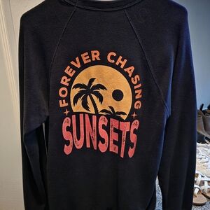 Bella Canvas Black Crewneck Sweater with Sunset Design